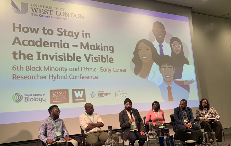 Speakers on stage at the Black Minority and Ethnic Early Career Researcher - How to Stay in Academia conference 2022