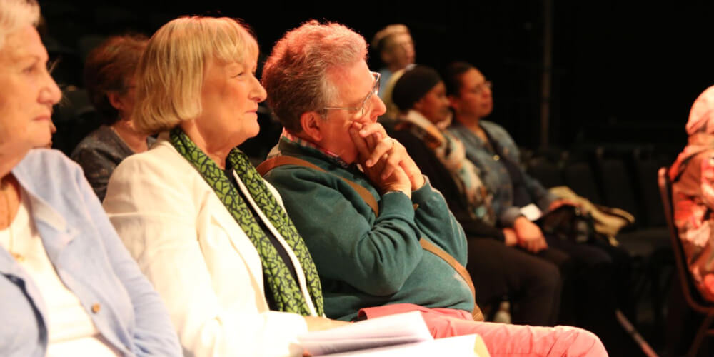 Audience members enamoured by a performance of The Last Siren.