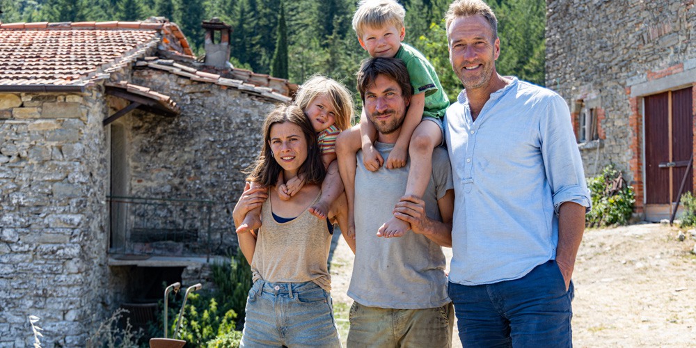 Ben Fogle with British couple George and Sophie in front of their farmhouse in Tuscany