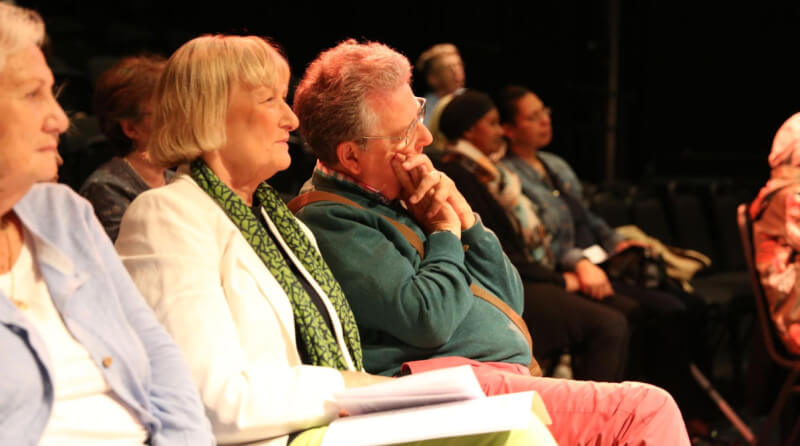 Audience members enamoured by a performance of The Last Siren.